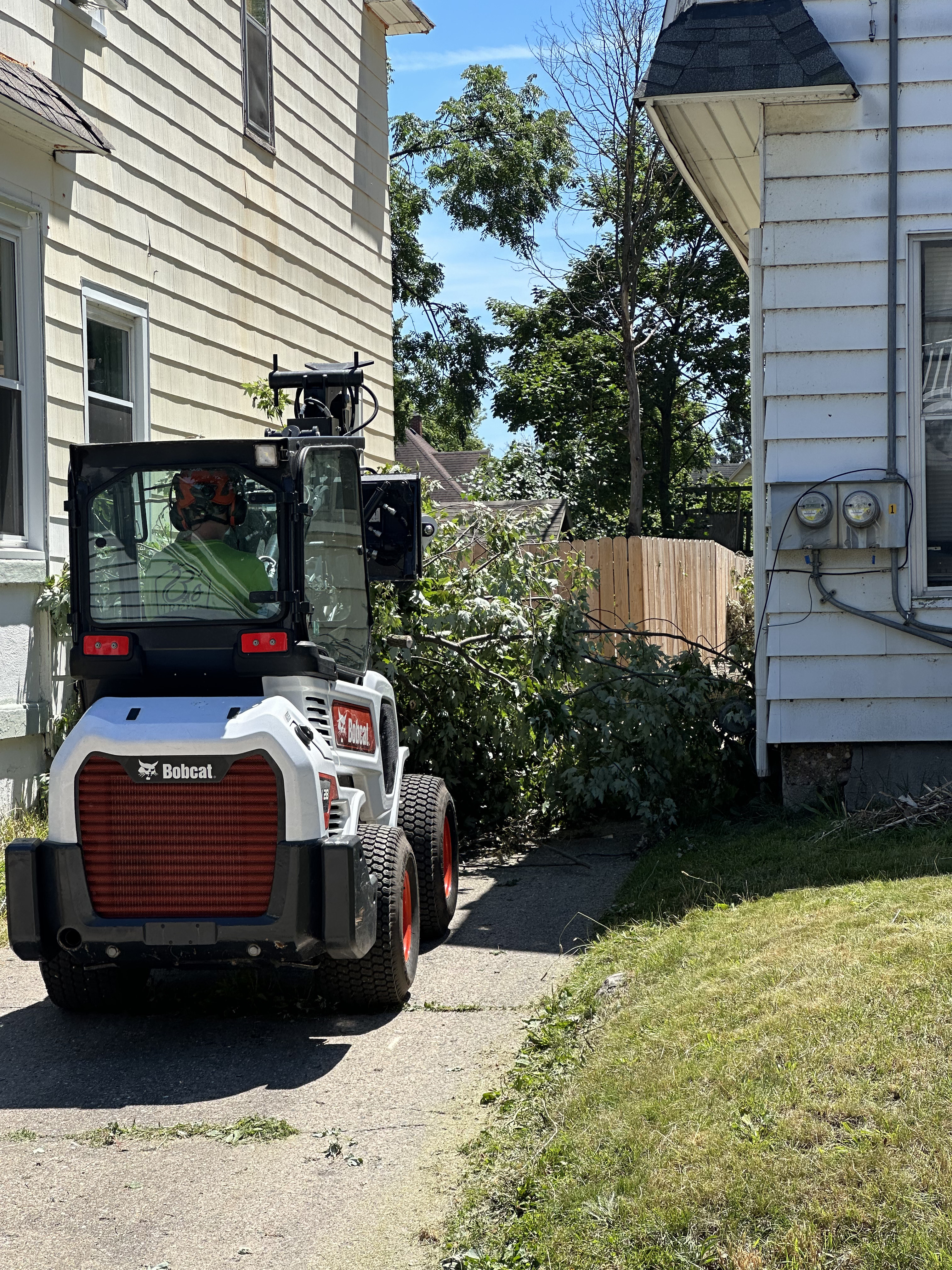 Precision chainsaw cutting at height